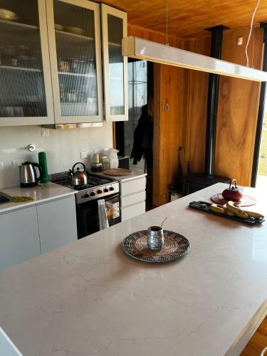 Eco house in a gated neighborhood with a lagoon and dock in San Andres de Giles