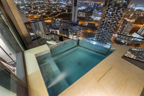 Stylish 1BR with Private Pool Near Circle Mall - image 7