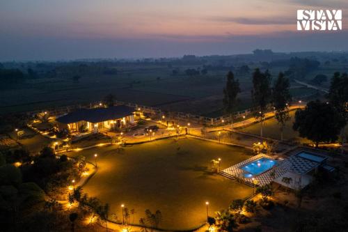 StayVista at Treeansh with Pool, Lawn