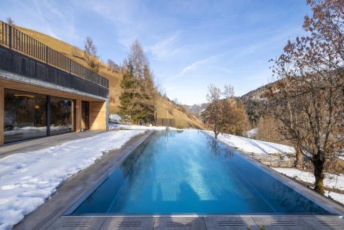 Les Dolomites Mountain Lodges 2