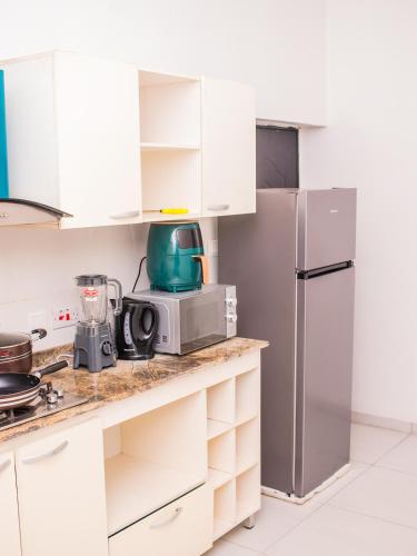 SKYKLASS Luxury home serviced apartment 24hrs Light smart tv smart home and water heater - image 5
