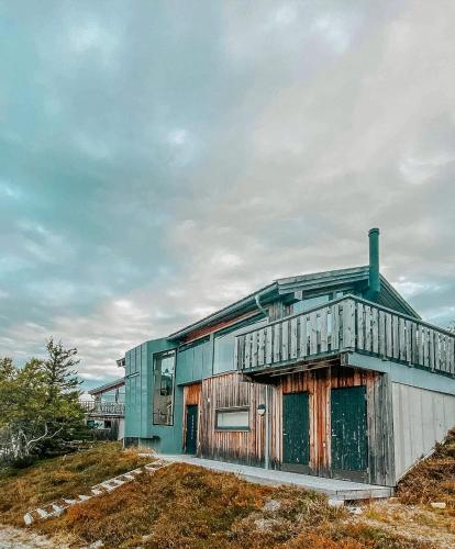 Viesnīcas āriene, Charming Cabin Overlooking Vegglifjell in Kravik