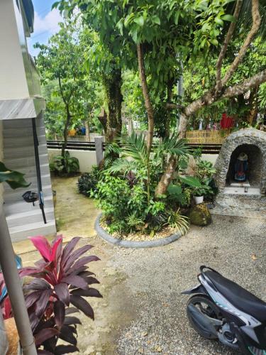 Attractions, Teachers Home in Malay