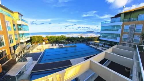 Costão do Santinho Penthouse - com acesso ao mar! – khách sạn tại Santinho Beach