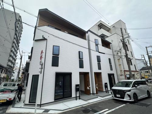 全新北歐奶油風民宿 日居Koguma 光 西九条站4分鐘直達USJ 關西機場 梅田 難波