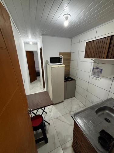 Kitnet SEM FILA KIT 10 min Lagoinha e Ponta das canas com ventilador in Lagoinha