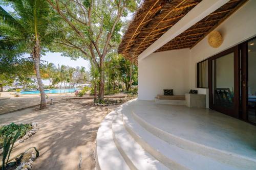 Spice Island Hotel & Resort Room Type - Deluxe Beach Front Room