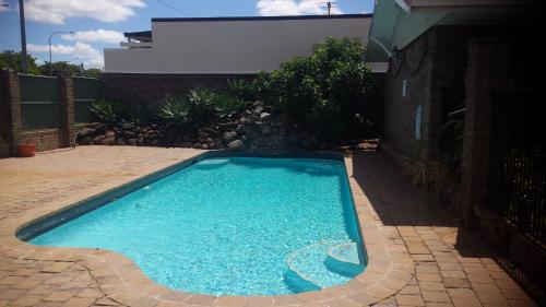 泳池, 牧場主休息汽車旅館 (Cattleman's Rest Motor Inn) in 查特斯堡