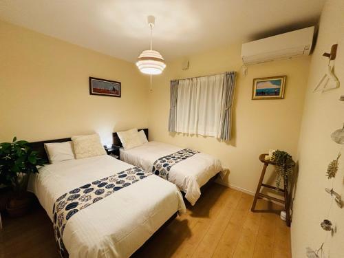 tazuraya-ritsurin-一棟貸切-無料駐車場