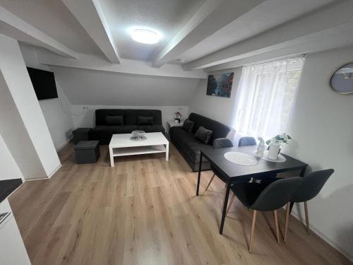 共用Lounge/電視區, Team at Home Gemütliches Dachgeschossapartment (Team at Home Gemutliches Dachgeschossapartment) in 布勞博伊倫