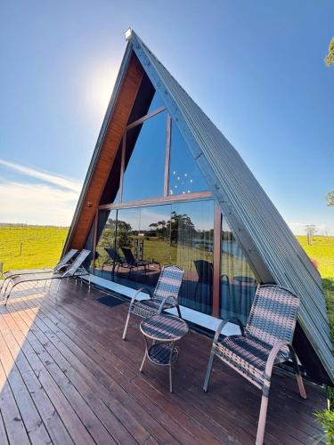 Chalé com hidromassagem de frente para a lagoa