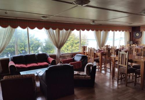 Koplietošanas atpūtas telpa ar TV, Hotel Bahia in Puerto Quellon