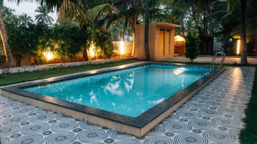 Peldbaseins, Yasuragi Boutique Resort in Courtallam