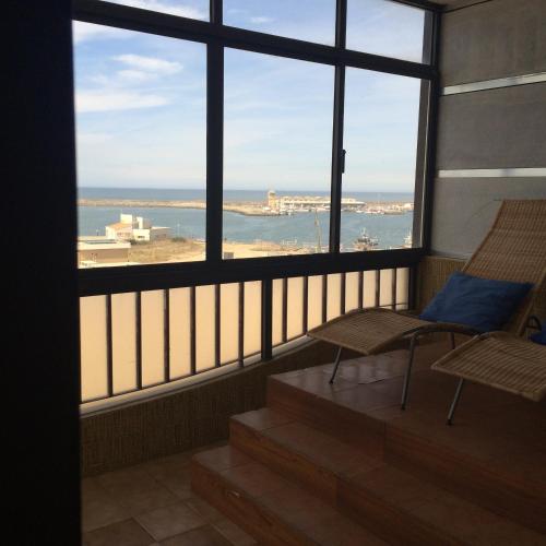 ทัศนียภาพ, Em frente a Praia e Marina in วิลลา โด คอนเด