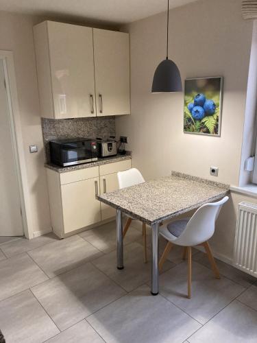 廚房, Ferienwohnungen bei der Purpurbuche in 巴德 哈爾茨堡