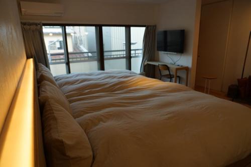 ゲストハウス弓と糸 Guesthouse Yumi To Ito 2F