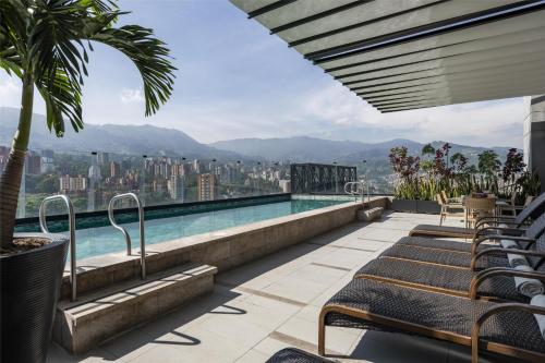York Medellin, Curio Collection by Hilton