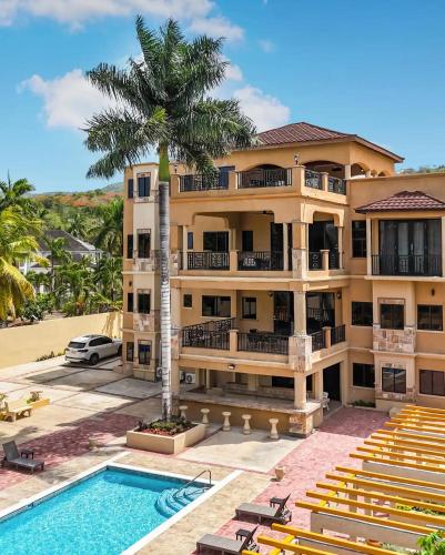 Vedere exterior, Sweet Palm Villa - Spacious luxury villa with pool and Beach oasis access in Saint Ann's Bay