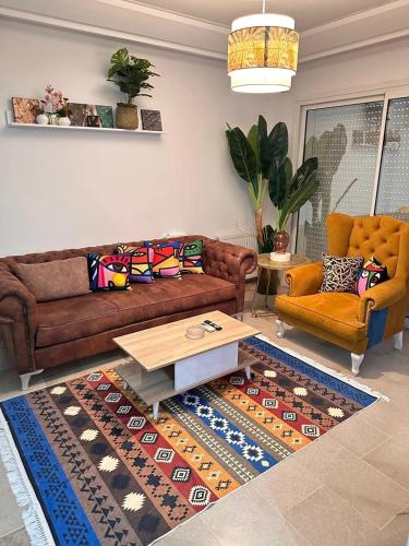 Appartement entier design et ambiance chaleureuse in Jardins De Carthage