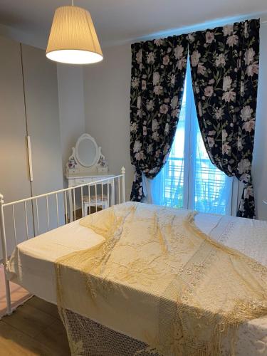 Ліжко, La Petite Maison Montopoli in Монтополі в Валь Д"Арно