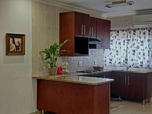 virtuve, Agapantha Cottage in Lobamba