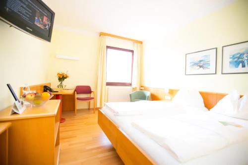 Das Reinisch Just Rooms in Bécsi nemzetközi repülőtér