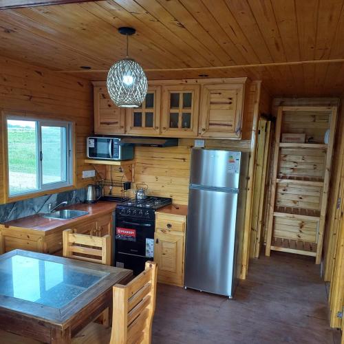 Cabaña totalmente equipada para 4 o 5 pers con piscina privada (Cabana totalmente equipada para 4 o 5 pers con piscina privada) in Canuelas