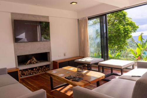 Koplietošanas atpūtas telpa ar TV, Casa Margarita Loft in Buenavista (Quindio)