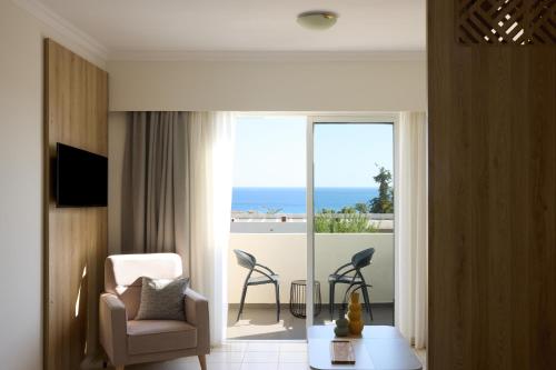 Kiotari Miraluna Beach Resort - Tap to explore photos