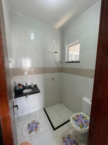 Ancuri retreat with backyard and barbecue area in Pacatuba