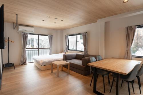 AURA YUZAWA Apartment Hotel - Spacious 1Bedroom Apartment with Large Living Room Sleeps 4 to 6, Bedroom with 2-Double Beds, Living Room with 1-Double Bed & 1-Sofa Bed