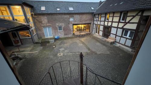 Ferienwohnung Monteurunterkunft auf historischem Vierkanthof ruhig, modern & funktional A in Zülpich, Deutschland