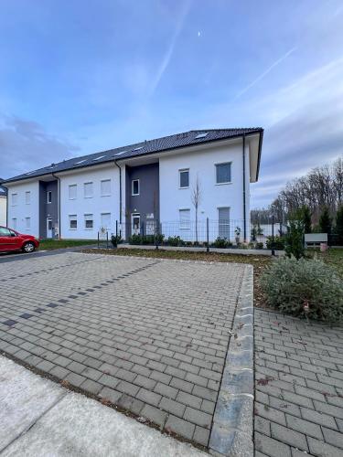Exterior view, Lake Town Apartments I. in Sarvar