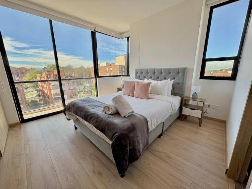 Luxury 1BR - Balcony - Coworking - City views