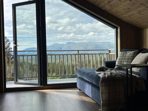 Modern and cozy mountain cabin - panoramic view! – khách sạn tại Torvetjorn