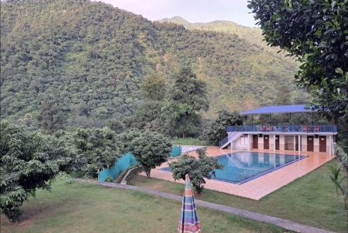 Shri Bhagrith Resort pool and restaurant