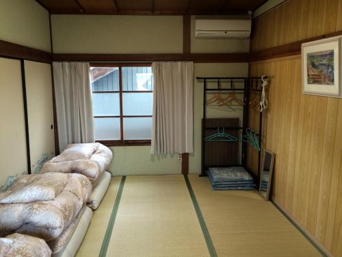 Guest House Genza Guest House Genza is perfectly located for both business and leisure guests in Kagawa. Offering a variety of facilities and services, the property provides all you need for a good nights sleep. Servi