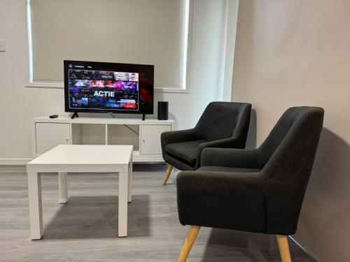 sala de TV, StayEazy Rentals in Alrededores Este de Brisbane