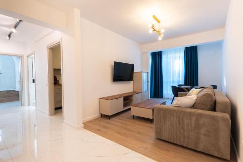Skupni salon/TV območje, Elite Comfort Apartament in Scheia