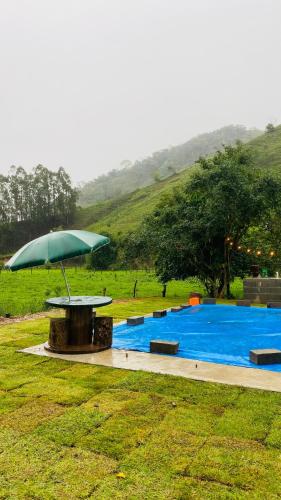 Refúgio no Campo com Piscina e Cachoeira (Refugio no Campo com Piscina e Cachoeira) in Mercês (Minas Gerais)