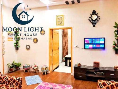 Shared lounge/TV area, Moon Light Guest House Islamabad  in Islamabad