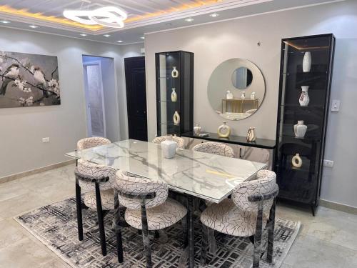 ديار الاقامة للشقق الفندقية المفروشة بمدينه نصر Room Type - Three-Bedroom Apartment