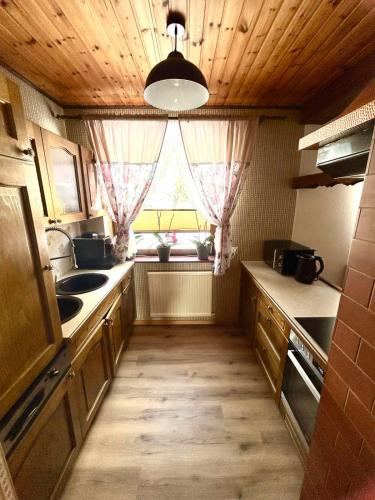מטבח, Villa Natalie - Panorama Apartment mit Bergblick, Semmering in סטאינחאוס אם סמרינג