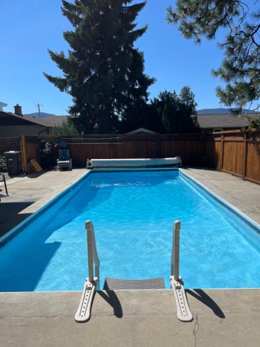 Bright poolside walkout two bedroom basement suite in the Okanagan in Penticton, Canada