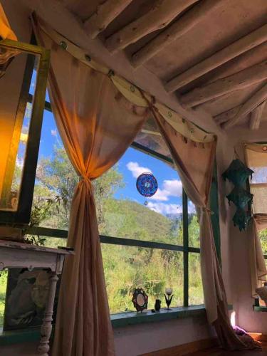 Cosmika, eco casa de montaña (Cosmika, eco casa de montana) in ลาส กาเยส