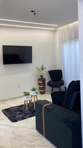 Shared lounge/TV area, Casa Sonho Real - Frente Mar com Piscina Privativa in Industrial Zone