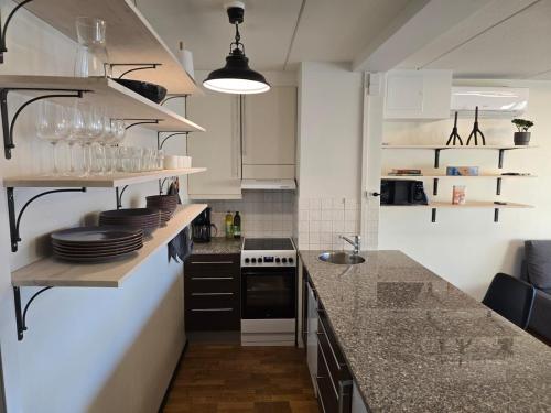 Stylish two-room apartment with balcony & great views in Töölö
