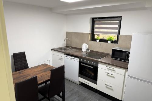 廚房, 4 Zimmer Ferienwohnung Egelsbach in 埃格爾斯巴赫