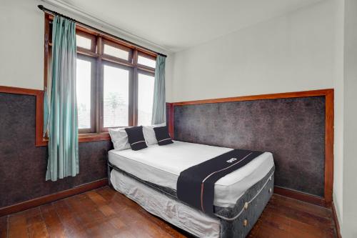 Hotel O Bungalow Homestay Room Type - Deluxe Double Room