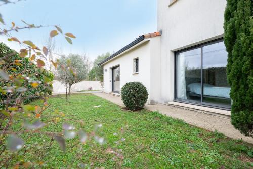 Maison Épure - maison mitoyenne avec jardin - Location saisonnière - Colomiers